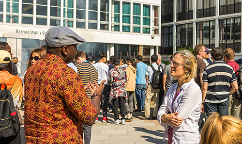 Alice Larkin talking to students at MACE BBQ