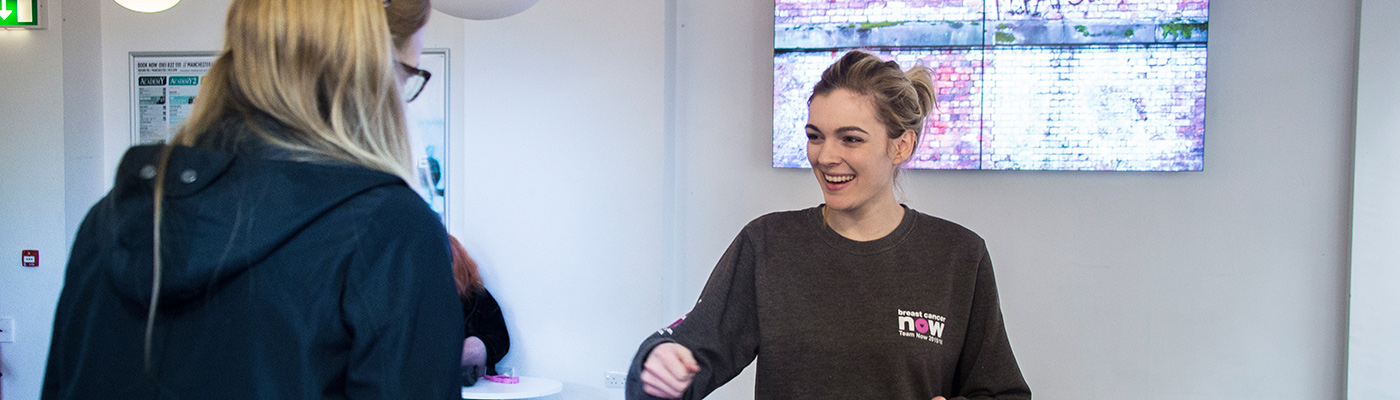 Female student smiling at RAG week event