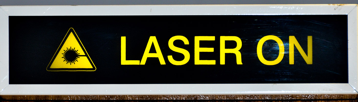 Sign reading 'Laser On'