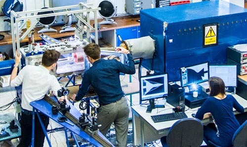 students in a flight simulation workshop