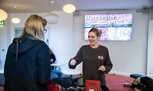 Female student smiling at RAG week event